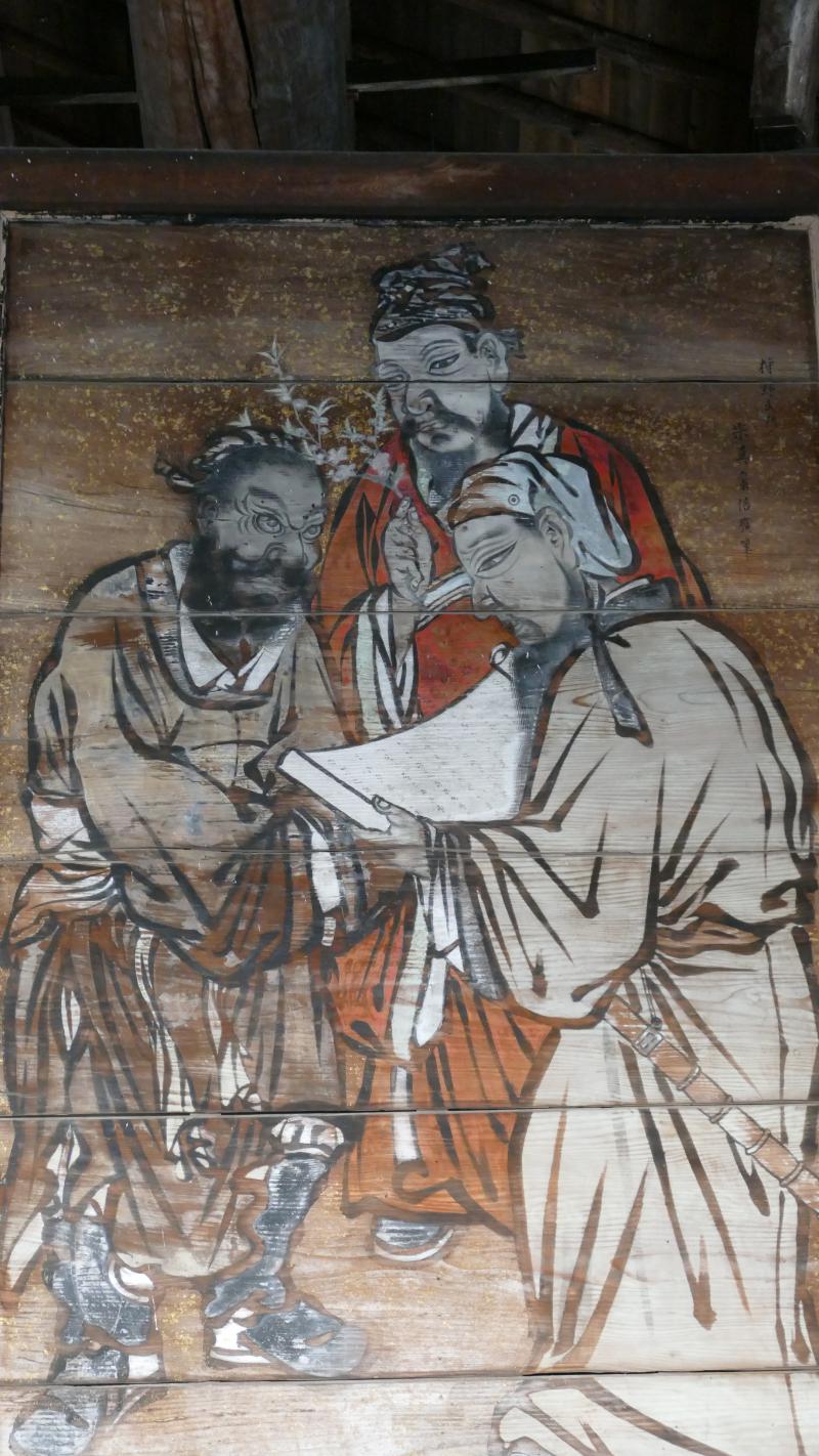 Trzej japońscy mędrcy przy lekturze. Stare malowidło na deskach w świątyni Toyokuni